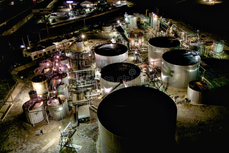 Oil refinery and tank farm at night
